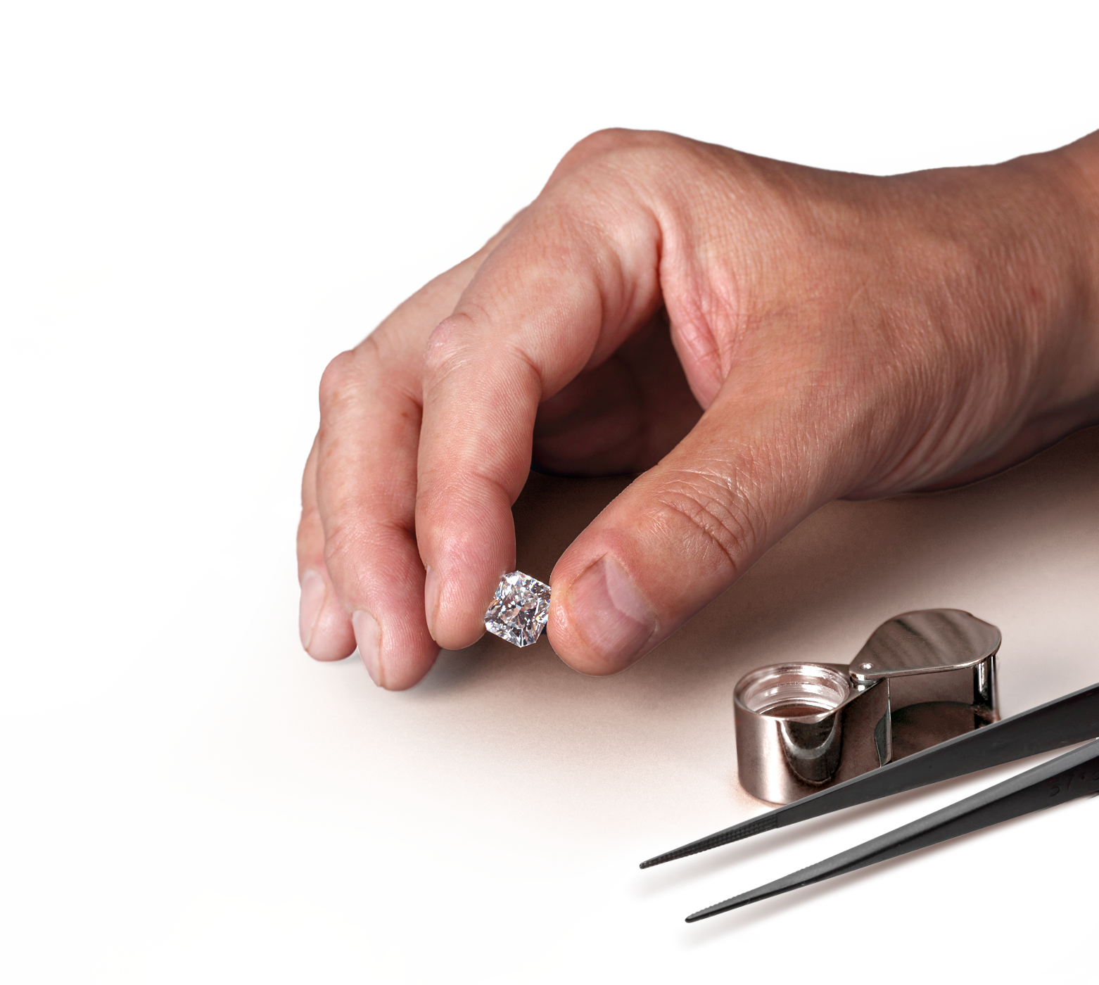 Hand holding diamond